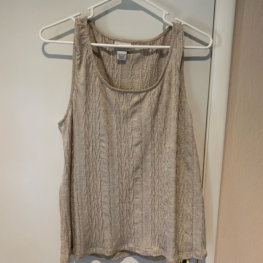 Sleeveless blouse by Chico’s.  Pre-owned, size 2, tan, polyester, made in USA.